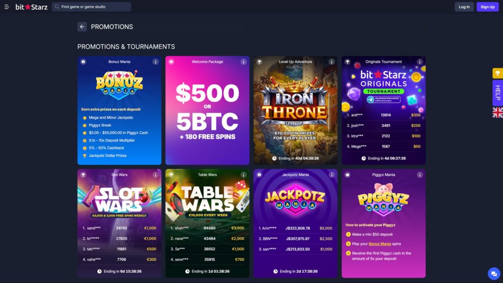 A high-definition screenshot of the BitStarz Casino "Promotions & Tournaments" page. The dark-themed interface features colorful tiles for various offers, including a Welcome Package of $500 or 5 BTC plus 180 free spins, and the "Iron Throne Level Up Adventure" with $70,000 in prizes. Competitive tournaments are showcased with live leaderboards, including Slot Wars (€5,000 weekly), Table Wars (€10,000 weekly), and the Originals Tournament. Other active promotions displayed include Bonuz Mania, Jackpotz Mania, and Piggyz Mania, each highlighting specific cash prizes, deposit multipliers, and cashback rewards