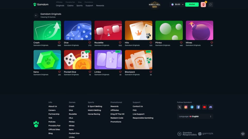 A high-definition screenshot of the Gamdom Originals game library on the official Gamdom crypto casino platform. The dark-themed interface showcases 10 proprietary games with colorful icons, including Crash, Dice, Roulette, Hilo, Plinko, Mines, Keno, Pocket Dice, Limbo, and Blackjack. The footer provides comprehensive navigation for E-Sport Betting, Match Betting, and Horse Racing, along with links to Provably Fair policies, Rewards, and Affiliates. Social media icons for X, Instagram, Telegram, Facebook, YouTube, and Discord are visible alongside a "Gamble Responsibly" certification