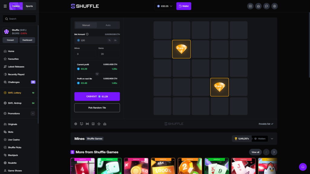 Shuffle.com online crypto casino Mines game interface displayed in active mid-round gameplay, featuring a 5x5 grid game board configured with 3 mines and 20 gems, two golden diamond gem tiles successfully revealed and highlighted with orange borders in the second and fourth rows, current profit panel showing €0.29 (0.0001438 ETH) at a 1.29x multiplier, profit on next tile estimated at €0.48 (1.48x), purple Cashout button displaying €1.29, ETH balance of €83.35 in the top header, and the left navigation sidebar showing Casino categories including Originals, Slots, Live Casino, Blackjack, Roulette, plus the SHFL token price ticker at $0.3113 (-2.93%)