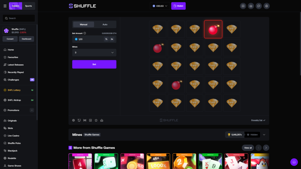 Shuffle.com Mines provably fair crypto casino game displaying the full board reveal at end of round, exposing every position on the 5x5 grid with 3 red bomb mine tiles scattered across the top row, second row, and middle row, alongside 22 golden diamond gem tiles filling the remaining squares, game controls reset to a new betting state with €1.00 bet amount and 3 Mines selected from a dropdown, large purple Bet button ready for the next round, ETH balance updated to €83.63, and the Mines Shuffle Games footer showing a maximum payout of 5,148,297x and Hidden mode toggle