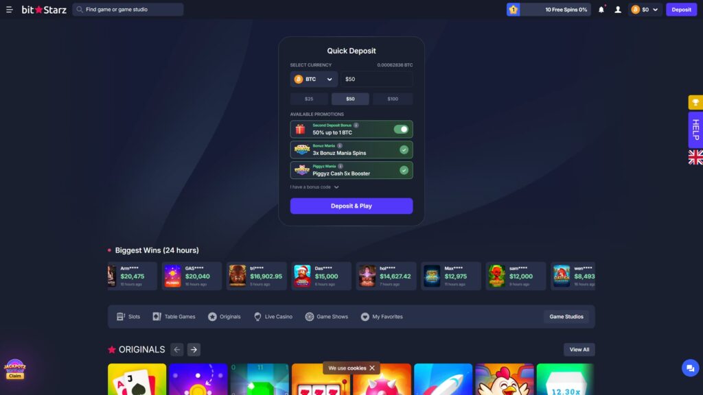 BitStarz online crypto casino Quick Deposit modal centered on a dark navy gradient background, prompting players to select a deposit currency with BTC chosen from a dropdown alongside a $50 USD-equivalent amount field showing 0.00062836 BTC conversion, three quick-pick deposit preset buttons for $25, $50 (highlighted), and $100, an Available Promotions section featuring three stackable bonus toggles including the activated 'Second Deposit Bonus — 50% up to 1 BTC' (turned on with a green toggle), 'Bonuz Mania — 3x Bonuz Mania Spins', and 'Piggyz Mania — Piggyz Cash 5x Booster' both shown as enabled with green checkmarks, an 'I have a bonus code' expandable input link, prominent purple 'Deposit & Play' call-to-action button, Biggest Wins (24 hours) leaderboard strip below showing eight recent big winners with masked usernames including Arm**** with $20,475, GAS**** with $20,040 (Plinko), tri**** with $16,902.95, Das**** with $15,000, hol**** with $14,627.42, Max**** with $12,975, sam**** with $12,000 and wen**** with $8,493 alongside game thumbnails and timestamps, category filter row with Slots, Table Games, Originals, Live Casino, Game Shows, My Favorites and Game Studios buttons, ORIGINALS game carousel beginning at the bottom, BitStarz logo and game search bar in the top-left header, '10 Free Spins 0%' progress widget, $0 BTC balance with purple Deposit button in the top-right, animated 'JackPotz Claim' promotional widget in the bottom-left corner, vertical HELP support button on the right edge with a UK flag region selector, and a cookie consent notice at the bottom